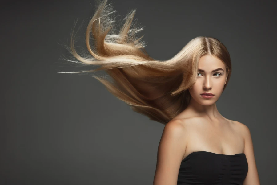 The 2-in-1 Hot Comb Hair Straightener with Fast Heating Anti-Scald Design tackles common hair woes effortlessly. Its clever design merges a comb and straightener into one sleek package. Say goodbye to juggling multiple tools. This beauty essential heats up quickly, saving precious time during your busy day. Plus, its anti-scald feature keeps your scalp and hands safe, making it perfect for novices and pros alike.